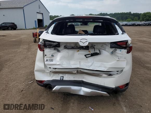 ✅ 2021 Mazda CX-5 Signature • VIN: JM3KFBEY2M0356013 • Lot: 66410025. Wystawiony na Copart z przebiegiem 47 279 mil. Bezpłatny archiwum sprzedaży aukcyjnych z USA i szczegółowy raport historii pojazdu na DreamBid. Zdjęcie 6.