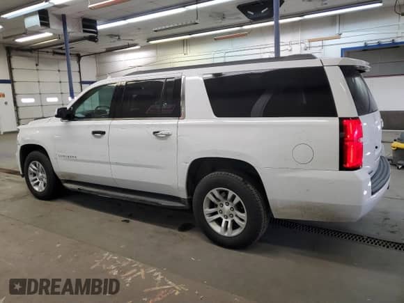 2018 Chevrolet Suburban LS z VIN 1GNSKGKC2JR188737, wystawiony jako Copart lot #42379025 z przebiegiem 159 815 mil mil oraz Szkoda całkowita • Salvage title. Historia ofert i sprzedaży dostępna na DreamBid. Obrazek 2.
