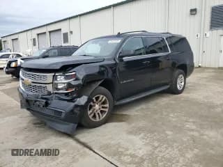 ✅ 2015 Chevrolet Suburban LT • VIN: 1GNSCJKC1FR700571 • Lot: 84410105. Listed on Copart with 207,833 mi. Free auction sales archive from the USA and detailed vehicle history report at DreamBid. Image 1.