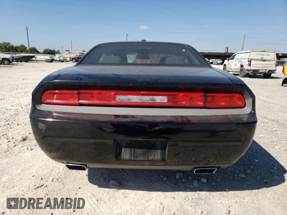 ✅ 2013 Dodge Challenger SXT • VIN: 2C3CDYAG1DH691640 • Lot: 77842744. Wystawiony na Copart z przebiegiem 181 343 mil. Bezpłatny archiwum sprzedaży aukcyjnych z USA i szczegółowy raport historii pojazdu na DreamBid. Zdjęcie 6.