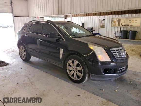 ✅ 2016 Cadillac SRX • VIN: 3GYFNAE38GS530976 • Lot: 61811775. Wystawiony na Copart z przebiegiem 220 745 mil. Bezpłatny archiwum sprzedaży aukcyjnych z USA i szczegółowy raport historii pojazdu na DreamBid. Zdjęcie 4.