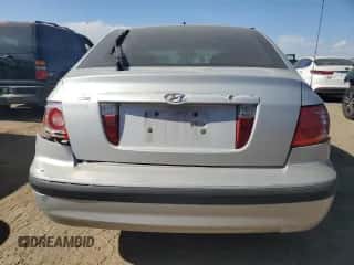 2006 Hyundai Elantra GLS z VIN KMHDN56D96U183082, wystawiony jako Copart lot #76459614 z przebiegiem 107 365 mil mil oraz Czysty tytuł • Clean title. Historia ofert i sprzedaży dostępna na DreamBid. Obrazek 6.