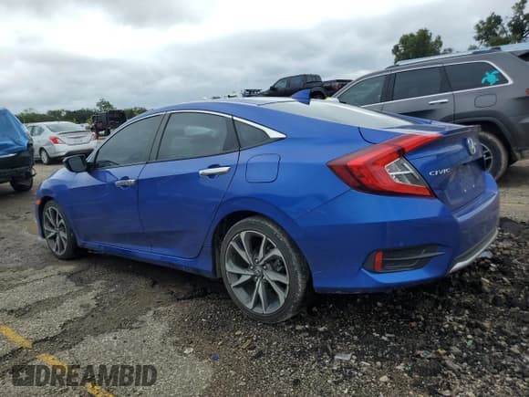 ✅ 2021 Honda Civic Touring • VIN: 19XFC1F99ME004297 • Lot: 81133185. Wystawiony na Copart z przebiegiem 42 528 mil. Bezpłatny archiwum sprzedaży aukcyjnych z USA i szczegółowy raport historii pojazdu na DreamBid. Zdjęcie 2.
