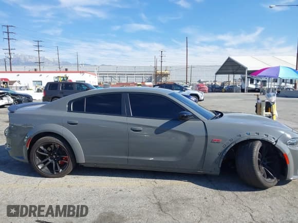 ✅ 2023 Dodge Charger Scat Pack Widebody • VIN: 2C3CDXGJ0PH663717 • Lot: 41840072. Listed on IAAI with 7,844 mi. Free auction sales archive from the USA and detailed vehicle history report at DreamBid. Image 18.
