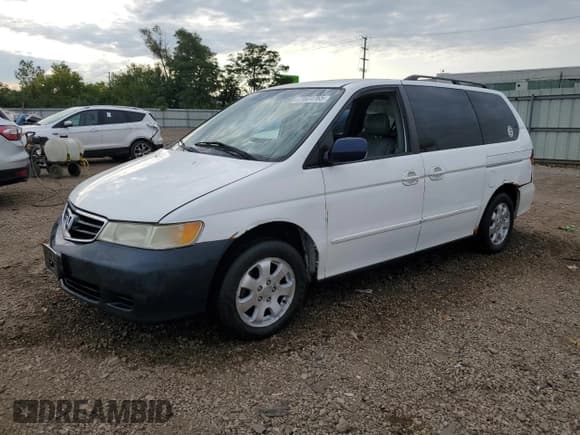 ✅ 2002 Honda Odyssey EX-L • VIN: 2HKRL18712H569502 • Lot: 71631765. Wystawiony na Copart z przebiegiem 176 117 mil. Bezpłatny archiwum sprzedaży aukcyjnych z USA i szczegółowy raport historii pojazdu na DreamBid. Zdjęcie 1.