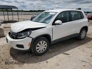 ✅ 2013 Volkswagen Tiguan • VIN: WVGCV3AXXDW601751 • Lot: 57767555. Listed on Copart with 98,425 mi. Free auction sales archive from the USA and detailed vehicle history report at DreamBid. Image 1.