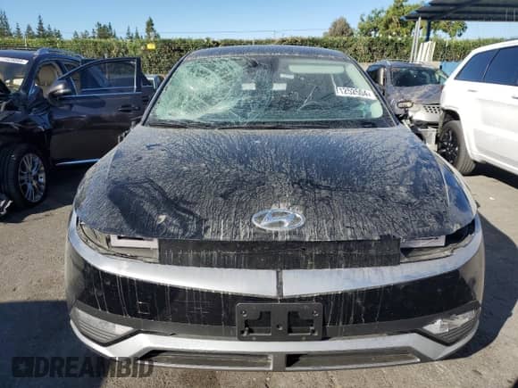 2024 Hyundai Ioniq 5 SE Standard Range z VIN KM8KM4DB1RU269805, wystawiony jako Copart lot #71252504 z przebiegiem Nie podano mil oraz Szkoda całkowita • Salvage title. Historia ofert i sprzedaży dostępna na DreamBid. Obrazek 5.