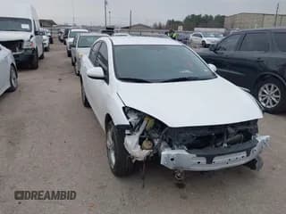 ✅ 2012 Mazda 3 i Touring • VIN: JM1BL1V71C1555730 • Lot: 41613565. Listed on IAAI with 83,607 mi. Free auction sales archive from the USA and detailed vehicle history report at DreamBid. Image 1.