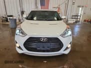 ✅ 2014 Hyundai Veloster Turbo • VIN: KMHTC6AE9EU196159 • Lot: 71451785. Wystawiony na Copart z przebiegiem 77 852 mil. Bezpłatny archiwum sprzedaży aukcyjnych z USA i szczegółowy raport historii pojazdu na DreamBid. Zdjęcie 5.