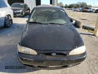 ✅ 1999 Ford Escort LX • VIN: 1FAFP10P5XW277376 • Lot: 82148204. Listed on Copart with 127,634 mi. Free auction sales archive from the USA and detailed vehicle history report at DreamBid. Image 5.