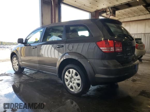 ✅ 2015 Dodge Journey American Value • VIN: 3C4PDCAB3FT556836 • Lot: 86071855. Wystawiony na Copart z przebiegiem 94 999 mil. Bezpłatny archiwum sprzedaży aukcyjnych z USA i szczegółowy raport historii pojazdu na DreamBid. Zdjęcie 2.