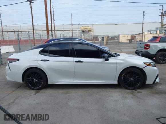 ✅ 2021 Toyota Camry XSE • VIN: 4T1K61AK8MU473250 • Lot: 43628826. Listed on IAAI with 76,044 mi. Free auction sales archive from the USA and detailed vehicle history report at DreamBid. Image 13.