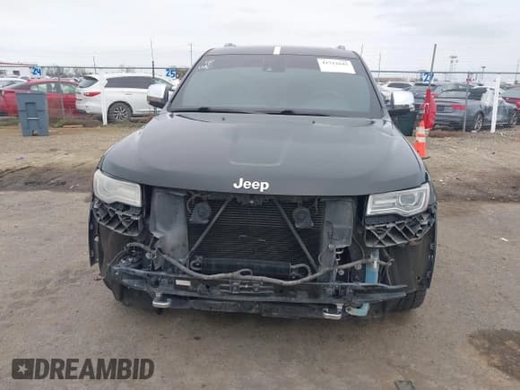 ✅ 2014 Jeep Grand Cherokee Overland • VIN: 1C4RJFCT2EC137783 • Lot: 41712645. Listed on IAAI with 166,964 mi. Free auction sales archive from the USA and detailed vehicle history report at DreamBid. Image 6.