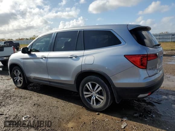 ✅ 2018 Honda Pilot EX-L • VIN: 5FNYF5H67JB002287 • Lot: 84826144. Listed on Copart with 129,280 mi. Free auction sales archive from the USA and detailed vehicle history report at DreamBid. Image 2.