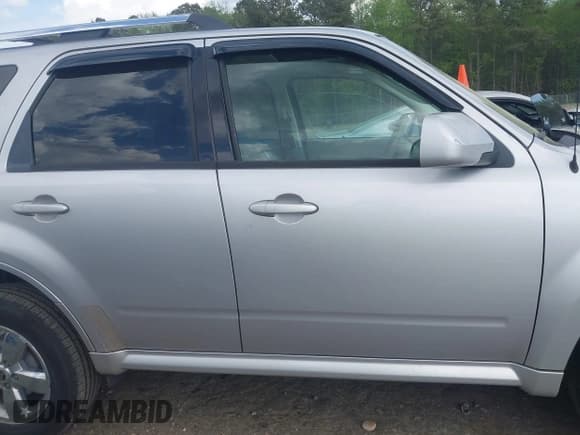 ✅ 2011 Mercury Mariner Premier • VIN: 4M2CN8H79BKJ02879 • Lot: 41961370. Listed on IAAI with 161,793 mi. Free auction sales archive from the USA and detailed vehicle history report at DreamBid. Image 12.