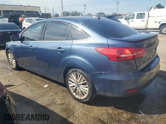 ✅ 2018 Ford Focus Titanium • VIN: 1FADP3J21JL285554 • Лот: 71536725. Опубликован ранее на Copart с пробегом 90 204 миль. Бесплатный доступ к архиву аукционных продаж из США и подробный отчёт об истории автомобиля на DreamBid. Изображение 2.