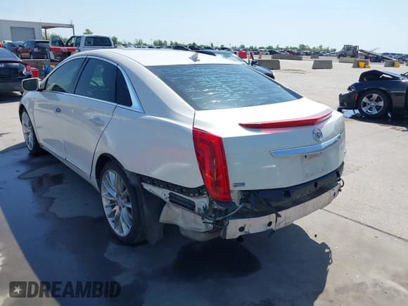 ✅ 2014 Cadillac XTS Platinum • VIN: 2G61S5S38E9199902 • Lot: 42000250. Listed on IAAI with 133,341 mi. Free auction sales archive from the USA and detailed vehicle history report at DreamBid. Image 3.