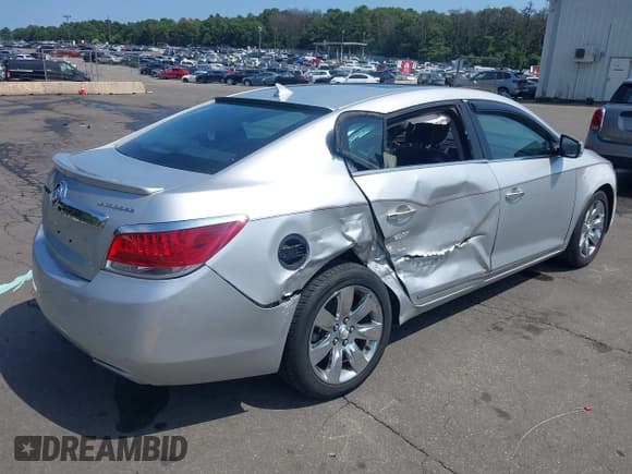 ✅ 2012 Buick LaCrosse Leather • VIN: 1G4GC5E31CF353608 • Lot: 42823310. Listed on IAAI with 64,945 mi. Free auction sales archive from the USA and detailed vehicle history report at DreamBid. Image 4.