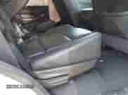 2020 Chevrolet Tahoe Premier with VIN 1GNSKCKJ8LR134496, listed as a IAAI auction lot 43360495 with 118,770 mi miles and . Bid and sale history available at DreamBid. Image 8.