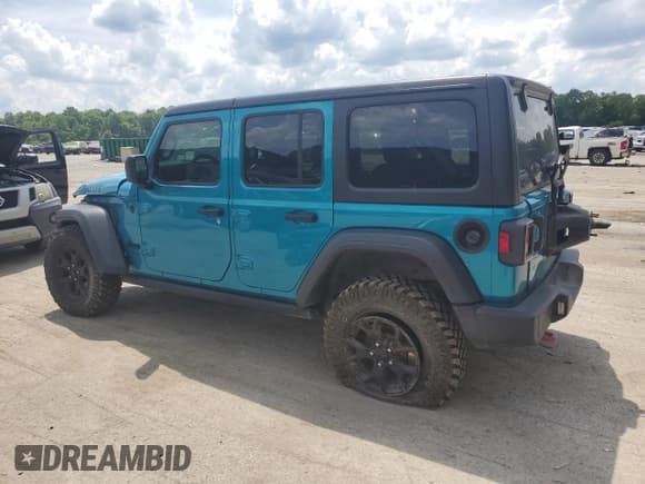 ✅ 2020 Jeep Wrangler Unlimited Black and Tan • VIN: 1C4HJXDN2LW158856 • Лот: 57668994. Опубликован ранее на Copart с пробегом 63 003 миль. Бесплатный доступ к архиву аукционных продаж из США и подробный отчёт об истории автомобиля на DreamBid. Изображение 2.