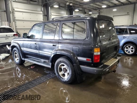 ✅ 1997 Toyota Land Cruiser • VIN: JT3HJ85J0V0184304 • Лот: 72438414. Опубликован ранее на Copart с пробегом 310 213 миль. Бесплатный доступ к архиву аукционных продаж из США и подробный отчёт об истории автомобиля на DreamBid. Изображение 2.