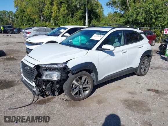 ✅ 2021 Hyundai Kona Limited • VIN: KM8K33A50MU618067 • Лот: 43711190. Опубликован ранее на IAAI с пробегом 51 022 миль. Бесплатный доступ к архиву аукционных продаж из США и подробный отчёт об истории автомобиля на DreamBid. Изображение 2.