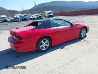 1997 Chevrolet Camaro RS z VIN 2G1FP22K9V2159811, wystawiony jako IAAI lot #41695051 z przebiegiem 113 647 mil mil oraz . Historia ofert i sprzedaży dostępna na DreamBid. Obrazek 4.