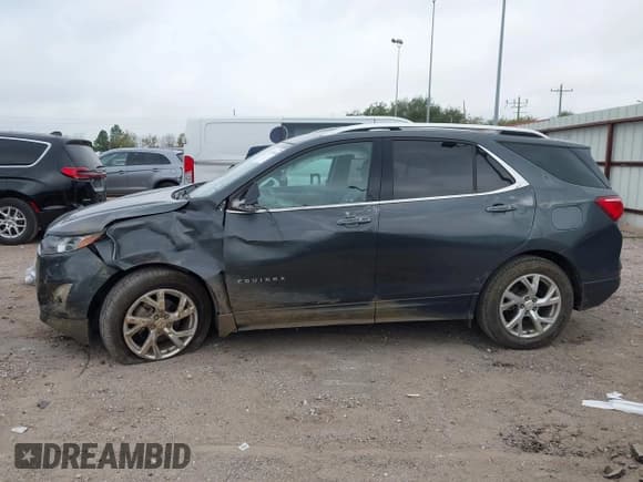 ✅ 2019 Chevrolet Equinox Premier • VIN: 2GNAXNEV2K6240654 • Lot: 43752084. Listed on IAAI with 74,882 mi. Free auction sales archive from the USA and detailed vehicle history report at DreamBid. Image 14.