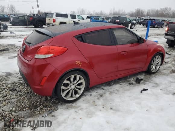 2012 Hyundai Veloster w/Red Int z VIN KMHTC6AD4CU077956, wystawiony jako Copart lot #43504505 z przebiegiem 103 183 mil mil oraz Szkoda całkowita • Salvage title. Historia ofert i sprzedaży dostępna na DreamBid. Obrazek 3.