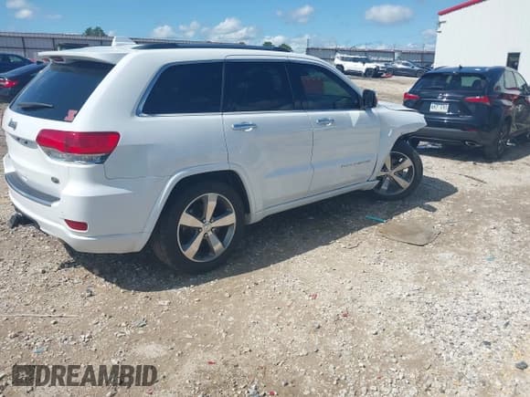 ✅ 2014 Jeep Grand Cherokee Overland • VIN: 1C4RJFCG0EC238873 • Lot: 42436535. Listed on IAAI with 154,384 mi. Free auction sales archive from the USA and detailed vehicle history report at DreamBid. Image 4.
