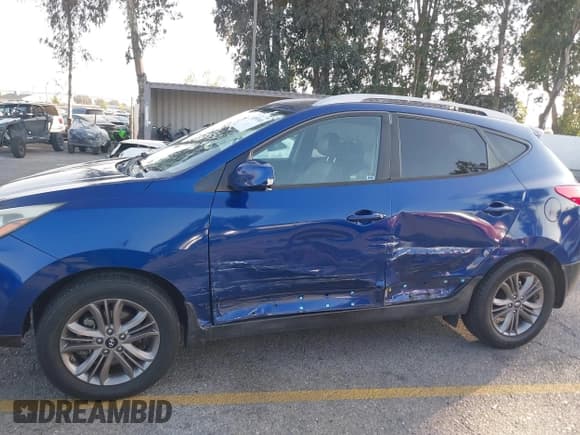 ✅ 2014 Hyundai Tucson SE • VIN: KM8JU3AG8EU795719 • Lot: 43553101. Wystawiony na IAAI z przebiegiem 117 762 mil. Bezpłatny archiwum sprzedaży aukcyjnych z USA i szczegółowy raport historii pojazdu na DreamBid. Zdjęcie 6.