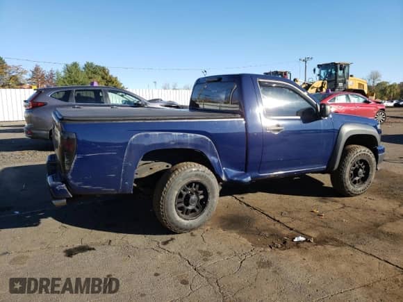2012 Chevrolet Colorado Work Truck with VIN 1GCGTBFE3C8125018, listed as a Copart auction lot 90024745 with 156,864 mi miles and Salvage title. Bid and sale history available at DreamBid. Image 3.