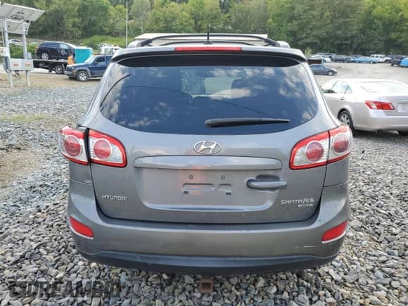 2010 Hyundai Santa Fe SE с VIN 5NMSHDAG0AH408729, выставлен на аукционе Copart как лот 69859684 с пробегом 167 907 миль миль и Списание • Salvage title. История ставок и продаж доступна на DreamBid. Изображение 6.
