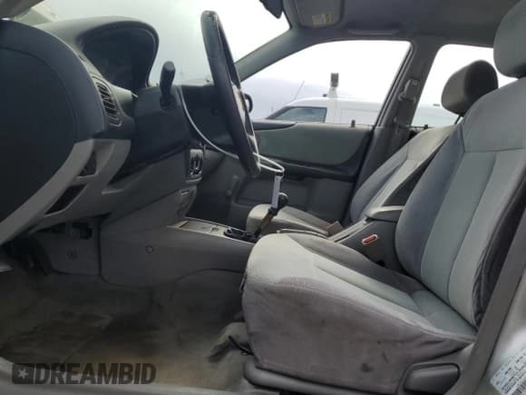 ✅ 2001 Mazda Protege DX • VIN: JM1BJ222310425181 • Lot: 88560255. Wystawiony na Copart z przebiegiem 201 942 mil. Bezpłatny archiwum sprzedaży aukcyjnych z USA i szczegółowy raport historii pojazdu na DreamBid. Zdjęcie 7.