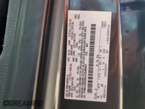 2018 Ford Escape SE z VIN 1FMCU9GD6JUD48647, wystawiony jako Copart lot #70868345 z przebiegiem 102 072 mil mil oraz Szkoda całkowita • Salvage title. Historia ofert i sprzedaży dostępna na DreamBid. Obrazek 13.