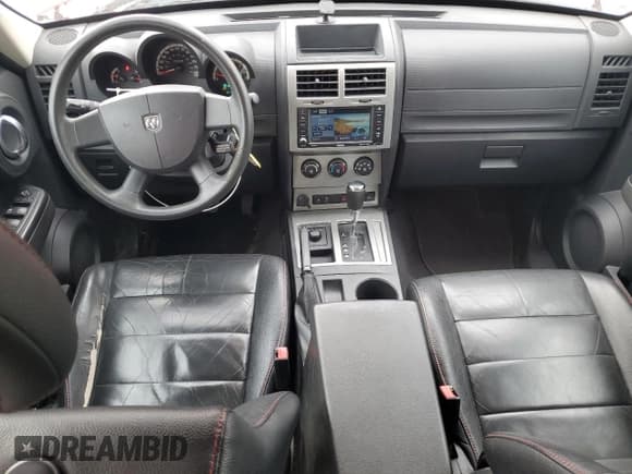 ✅ 2011 Dodge Nitro Heat • VIN: 1D4PU4GX0BW607368 • Lot: 86120515. Listed on Copart with 210,931 mi. Free auction sales archive from the USA and detailed vehicle history report at DreamBid. Image 8.