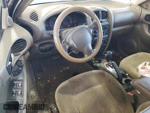 2004 Hyundai Santa Fe GLS z VIN KM8SC73D44U640309, wystawiony jako Copart lot #82621535 z przebiegiem 250 159 mil mil oraz Szkoda całkowita • Salvage title. Historia ofert i sprzedaży dostępna na DreamBid. Obrazek 8.