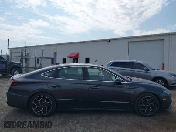 2021 Hyundai Sonata N Line with VIN 5NPEK4JC5MH108963, listed as a IAAI auction lot 43195113 with 101,460 mi miles and . Bid and sale history available at DreamBid. Image 13.