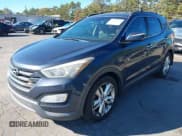 ✅ 2013 Hyundai Santa Fe Sport • VIN: 5XYZU3LA4DG099729 • Lot: 43463958. Listed on IAAI with 164,931 mi. Free auction sales archive from the USA and detailed vehicle history report at DreamBid. Image 2.