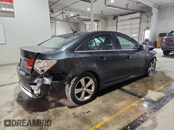 2014 Chevrolet Cruze 2LT с VIN 1G1PE5SB7E7429252, выставлен на аукционе Copart как лот 89543125 с пробегом 195 739 миль миль и Списание • Salvage title. История ставок и продаж доступна на DreamBid. Изображение 3.