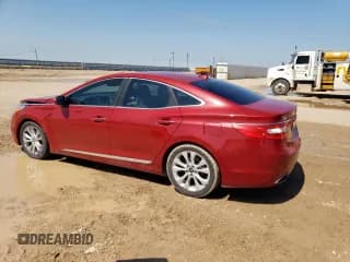 ✅ 2013 Hyundai Azera • VIN: KMHFG4JG5DA224594 • Лот: 59870195. Опубликован ранее на Copart с пробегом 124 316 миль. Бесплатный доступ к архиву аукционных продаж из США и подробный отчёт об истории автомобиля на DreamBid. Изображение 2.