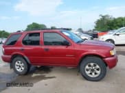 ✅ 2004 Isuzu Rodeo S • VIN: 4S2CK58Y444303591 • Lot: 42707772. Listed on IAAI with 156,792 mi. Free auction sales archive from the USA and detailed vehicle history report at DreamBid. Image 14.