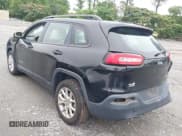 ✅ 2015 Jeep Cherokee Sport • VIN: 1C4PJLAB0FW761467 • Lot: 42362433. Listed on IAAI with 133,794 mi. Free auction sales archive from the USA and detailed vehicle history report at DreamBid. Image 3.