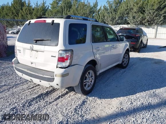 ✅ 2010 Mercury Mariner Premier • VIN: 4M2CN8HG0AKJ02994 • Lot: 43713687. Wystawiony na IAAI z przebiegiem 244 718 mil. Bezpłatny archiwum sprzedaży aukcyjnych z USA i szczegółowy raport historii pojazdu na DreamBid. Zdjęcie 4.