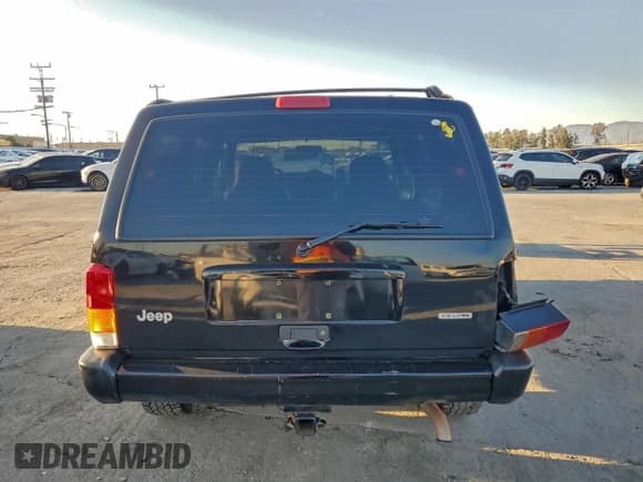 ✅ 2001 Jeep Cherokee Sport • VIN: 1J4FF48S51L596481 • Lot: 94193505. Listed on Copart with 127,415 mi. Free auction sales archive from the USA and detailed vehicle history report at DreamBid. Image 6.