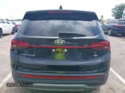 ✅ 2021 Hyundai Santa Fe SE • VIN: 5NMS1DAJ0MH318582 • Lot: 42681443. Listed on IAAI with 94,808 mi. Free auction sales archive from the USA and detailed vehicle history report at DreamBid. Image 16.