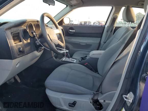 2007 Dodge Charger z VIN 2B3KA43G67H826185, wystawiony jako Copart lot #78513794 z przebiegiem 95 739 mil mil oraz Szkoda całkowita • Salvage title. Historia ofert i sprzedaży dostępna na DreamBid. Obrazek 7.