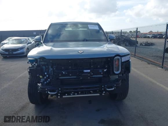 ✅ 2023 Rivian R1T Adventure • VIN: 7FCTGBAA6PN029019 • Lot: 43428333. Listed on IAAI with 13,983 mi. Free auction sales archive from the USA and detailed vehicle history report at DreamBid. Image 13.