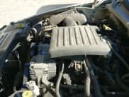 ✅ 2000 Dodge Durango • VIN: 1B4HS28N8YF266719 • Lot: 43621339. Wystawiony na IAAI z przebiegiem 289 719 mil. Bezpłatny archiwum sprzedaży aukcyjnych z USA i szczegółowy raport historii pojazdu na DreamBid. Zdjęcie 12.