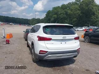 ✅ 2019 Hyundai Santa Fe SE • VIN: 5NMS2CAD6KH128817 • Лот: 43140291. Опубликован ранее на IAAI с пробегом 111 336 миль. Бесплатный доступ к архиву аукционных продаж из США и подробный отчёт об истории автомобиля на DreamBid. Изображение 3.